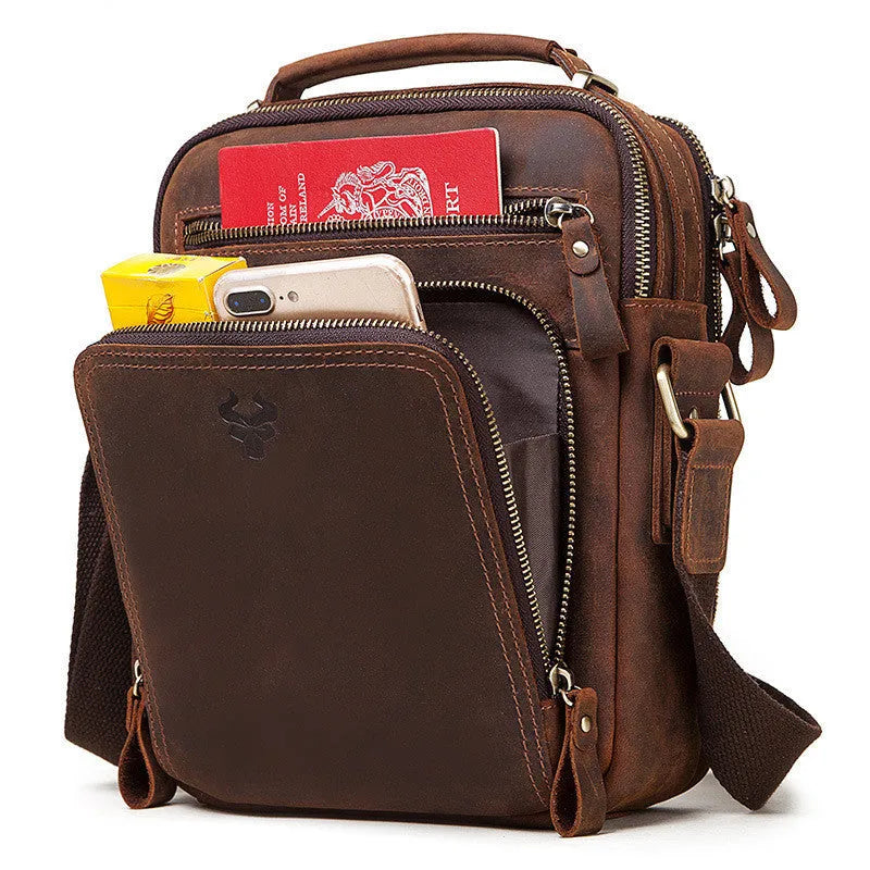 Men's brown genuine Crazy Horse leather crossbody bag with a single shoulder strap and retro sewing detail.
