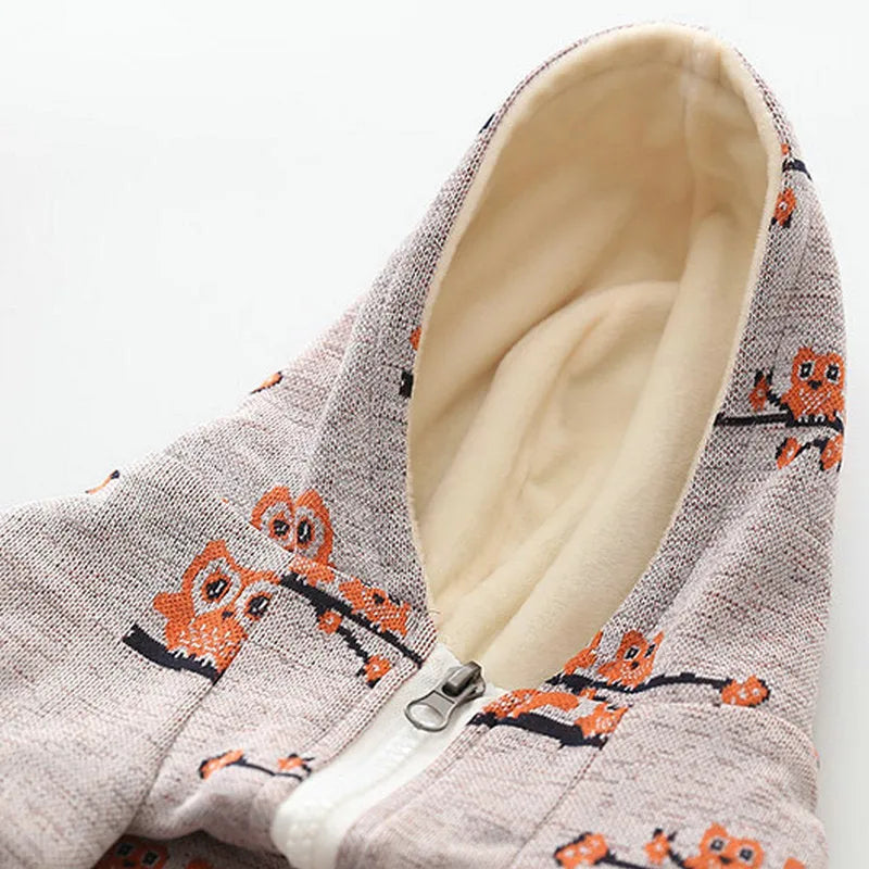 Blue and pink casual dog sweater with front zipper closure showing dog pattern design