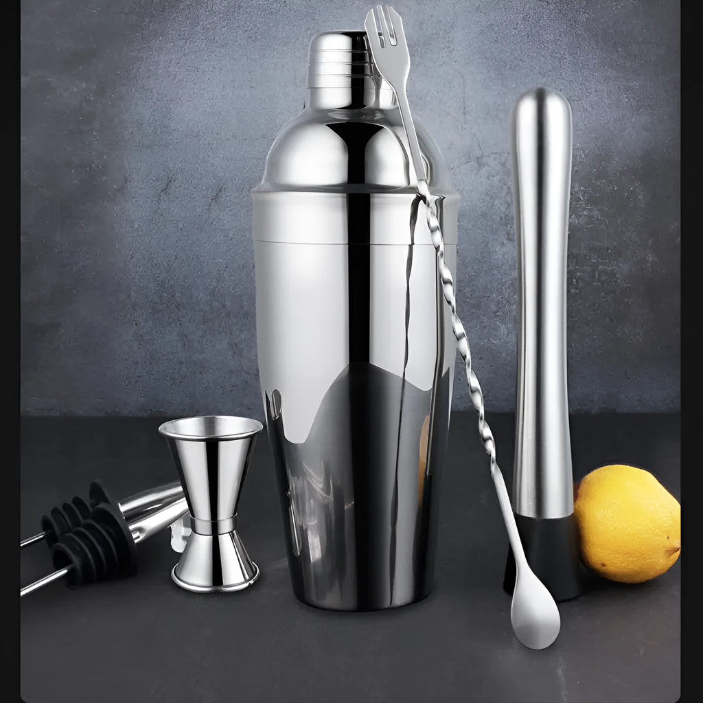 23-piece stainless steel cocktail set with shakers and bar tools on counter
