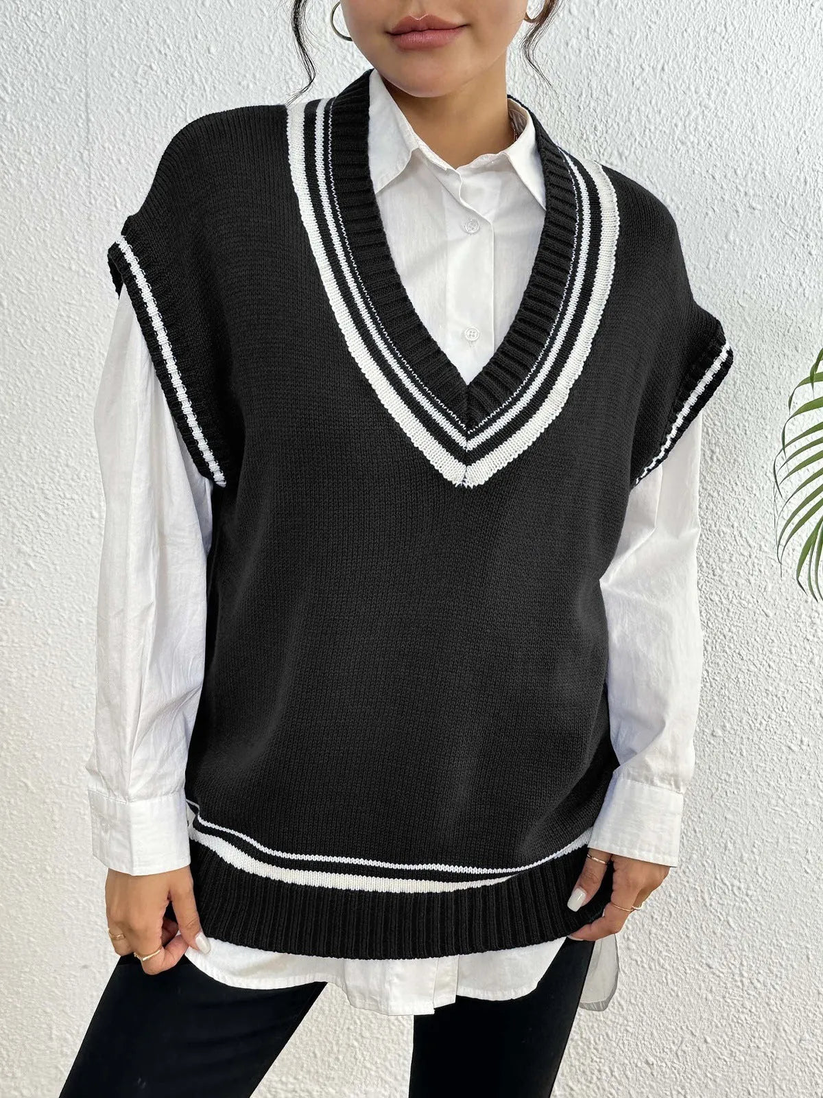Women's college style vest sweater in acrylic polyester blend fabric, loose fit, available in black blue coffee colours