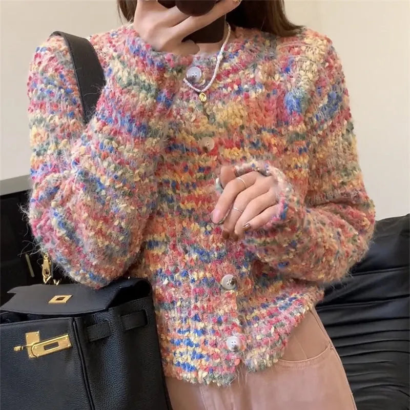 Retro slim fit pink knitted cardigan with regular sleeves on a hanger