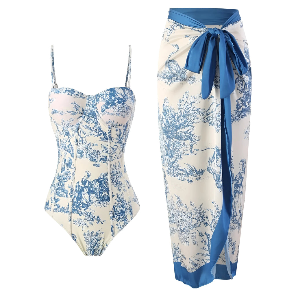 Blue patterned one-piece swimsuit for women with a matching gauze skirt