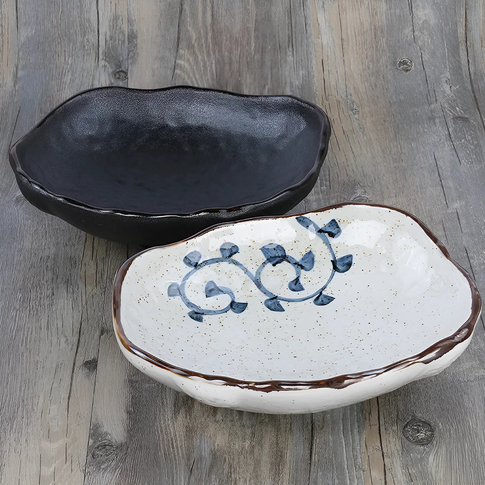 Japanese-style irregular shaped ceramic sashimi bowl with floral decorations measuring 24x21.5x7.5cm