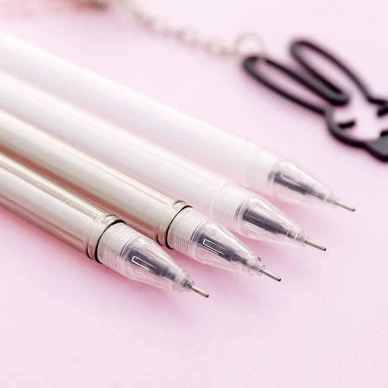 Gel pen with animal pendant charm, showing 0.38mm tip and 17cm plastic barrel.