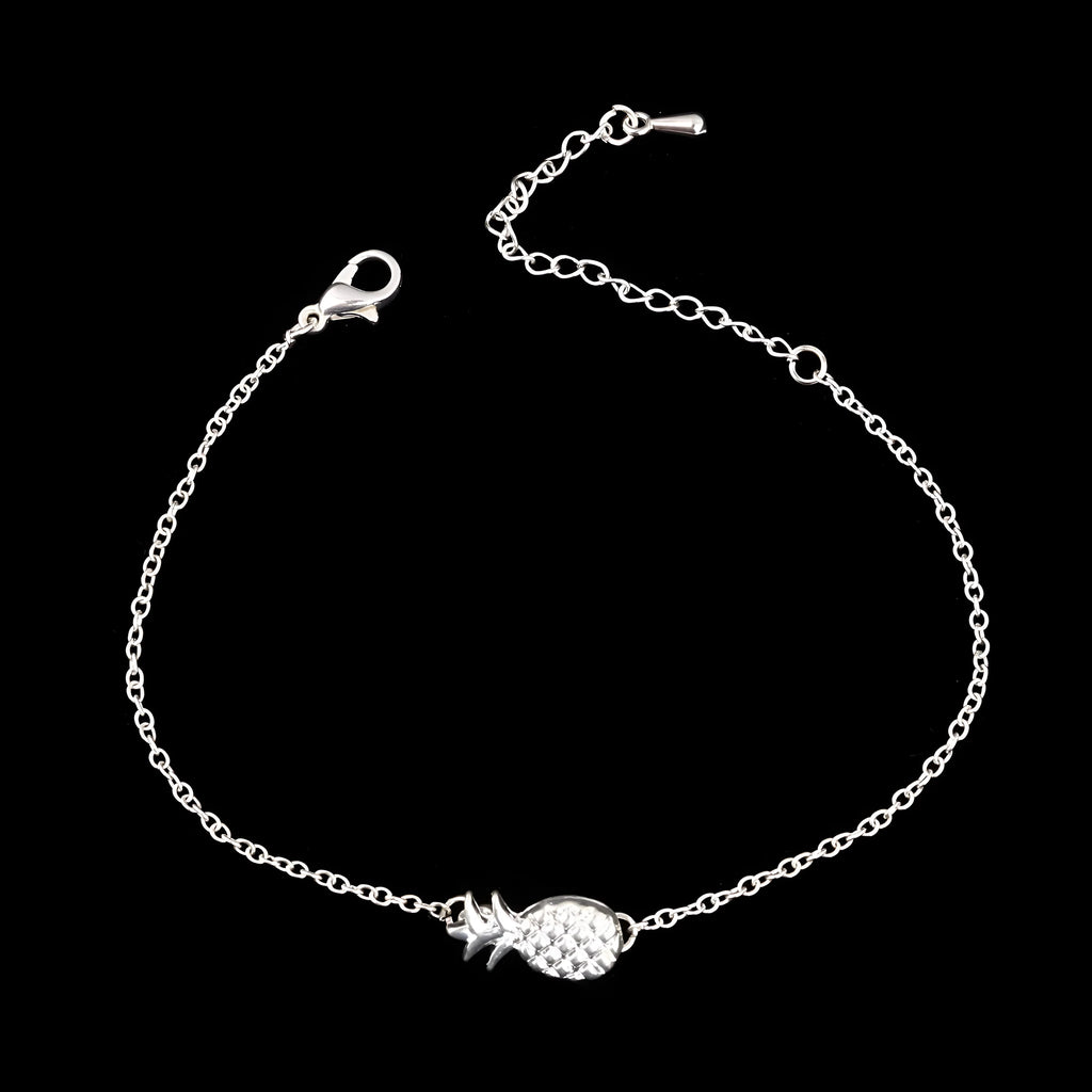 Women's alloy bracelet featuring a central pineapple charm in gold or silver colour.