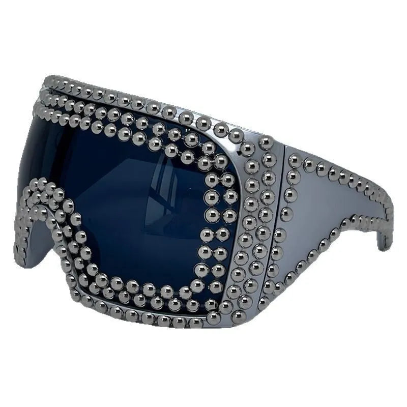 Men's punk sunglasses with large rim and square rivet details in gold colour