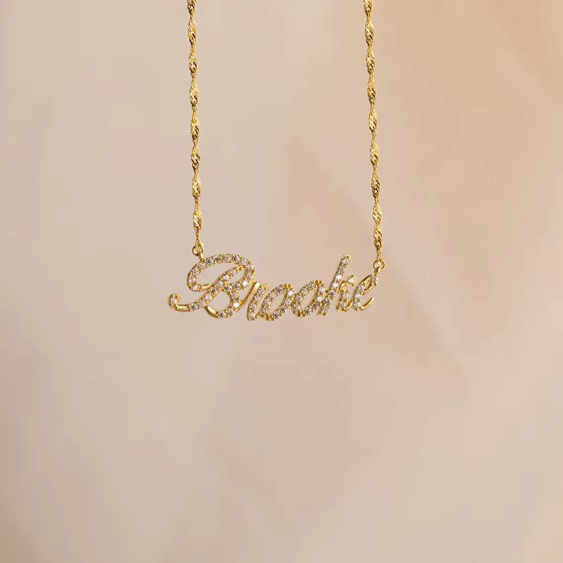 Customised copper geometric name necklace for women in gold finish