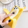 Yellow banana-coloured IMD back cover case for iPhone models 6 through 13 Pro Max on a table.