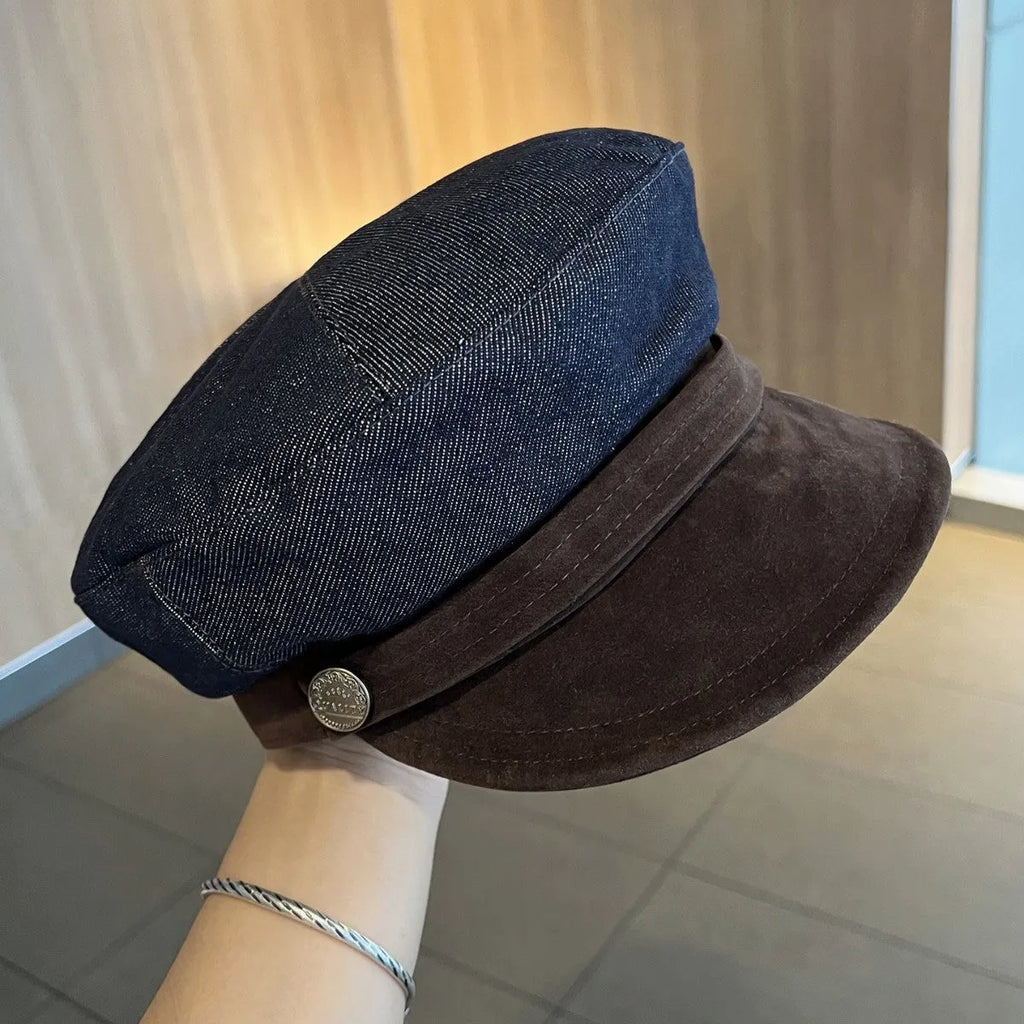Dark blue denim octagonal newsboy hat with adjustable 54-58cm sizing and colour accent brim options
