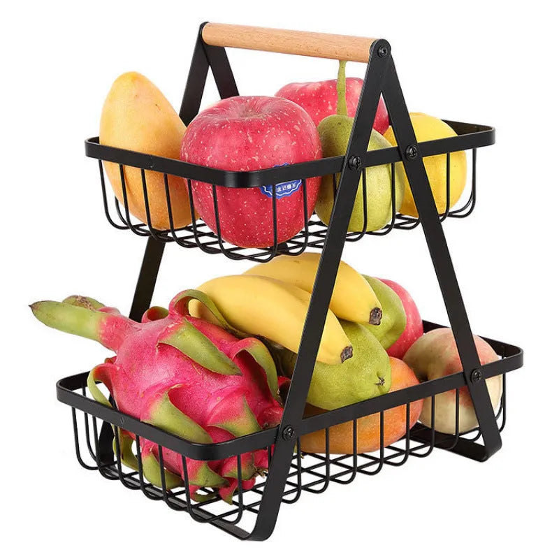 Detachable double-layer iron fruit basket with wooden handle in black on a kitchen tabletop