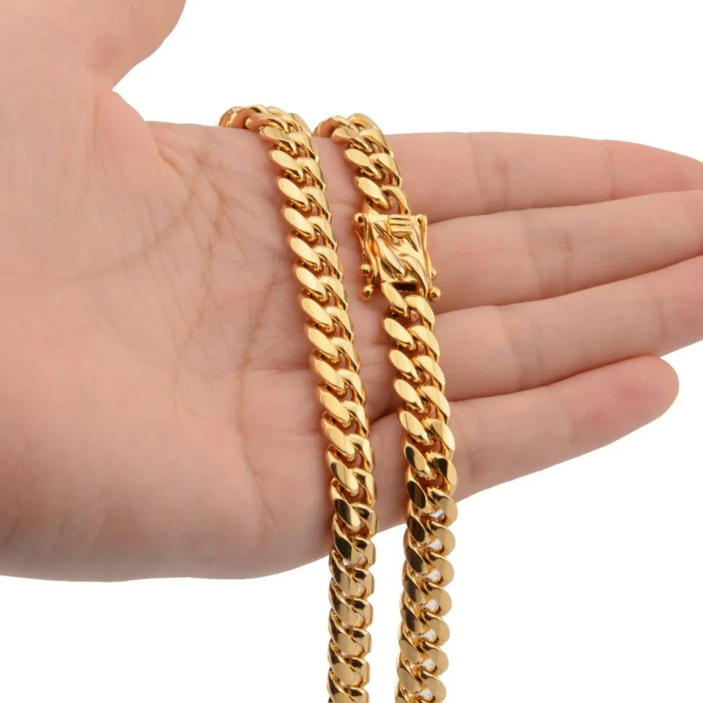 Gold stainless steel Miami Cuban link chain 12mm width on a white background