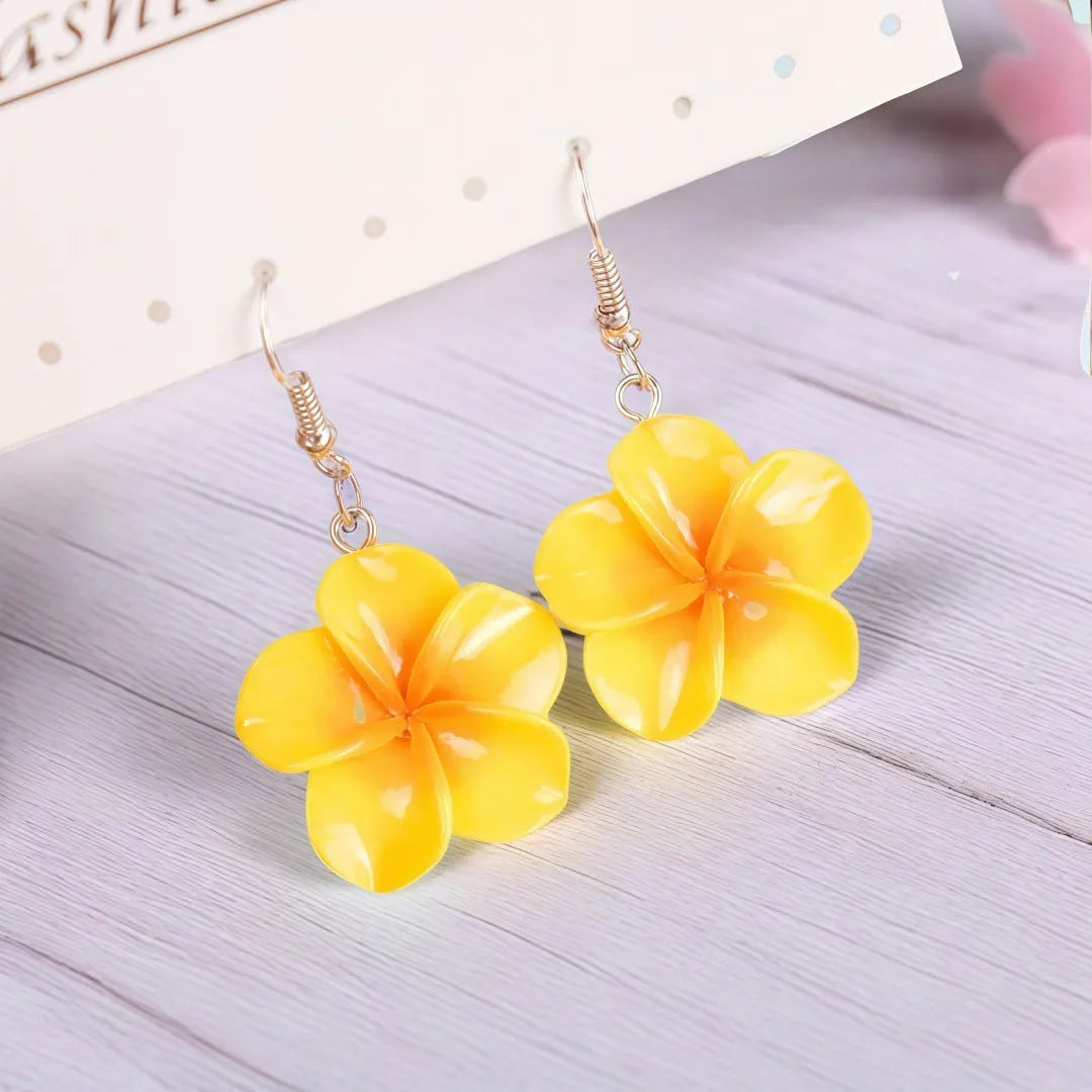 Handmade plastic resin earrings shaped like plumeria rubra flowers in a pair with multiple colour options
