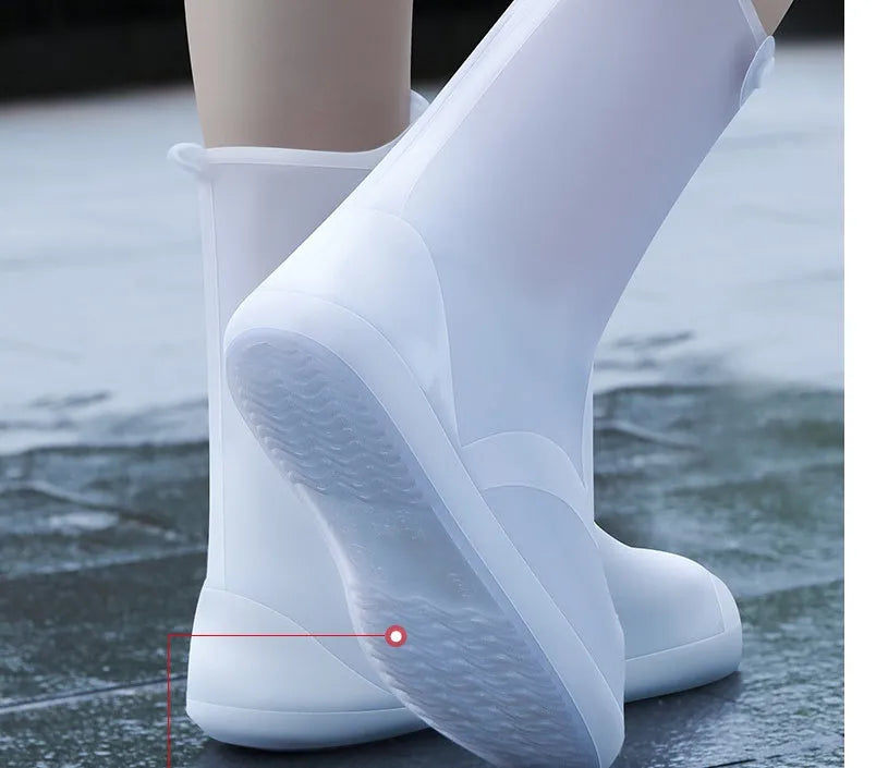 White high-top PVC reusable waterproof shoe covers for women with size chart showing measurements