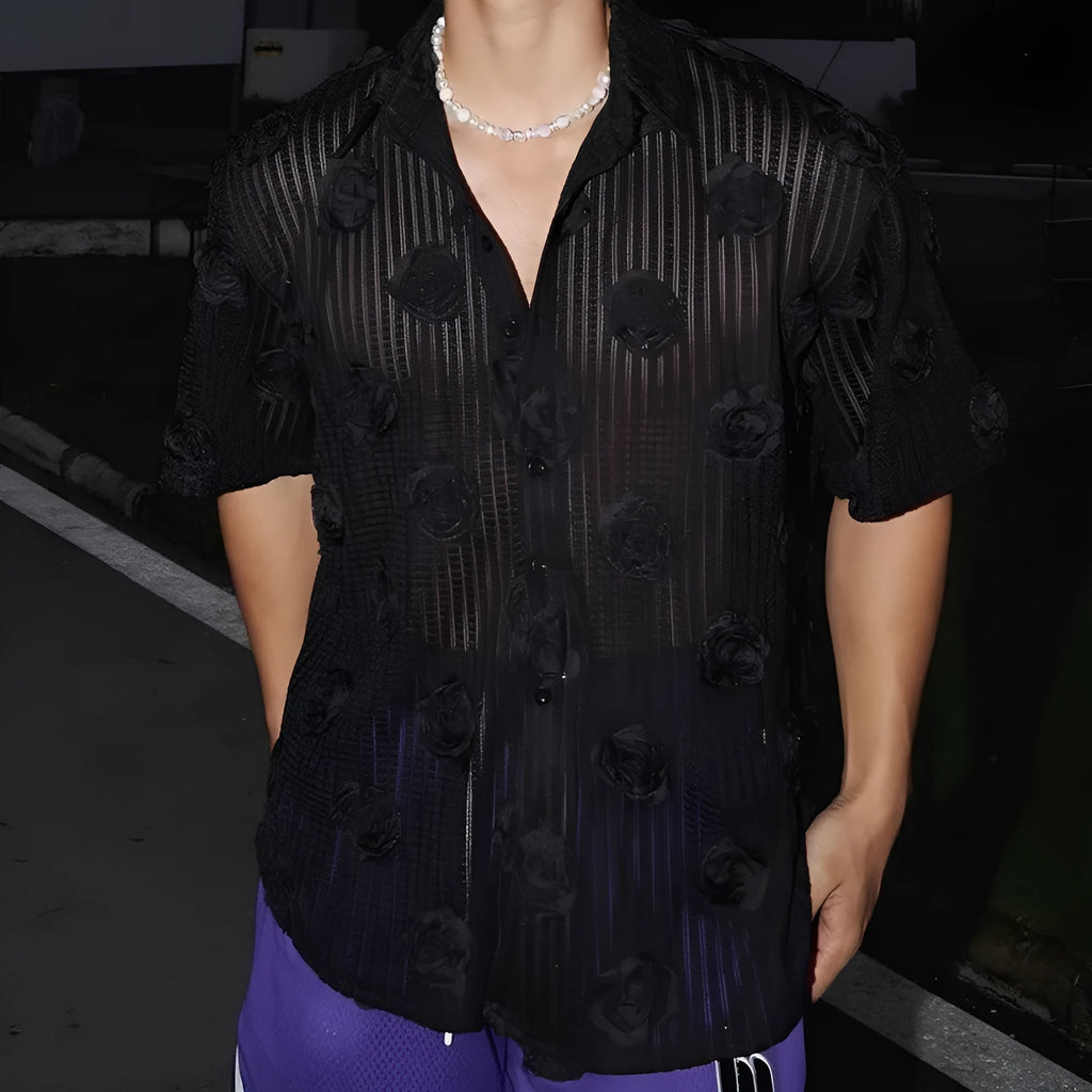 Man's loose fit short sleeve shirt with a heavy industry floral print in black.