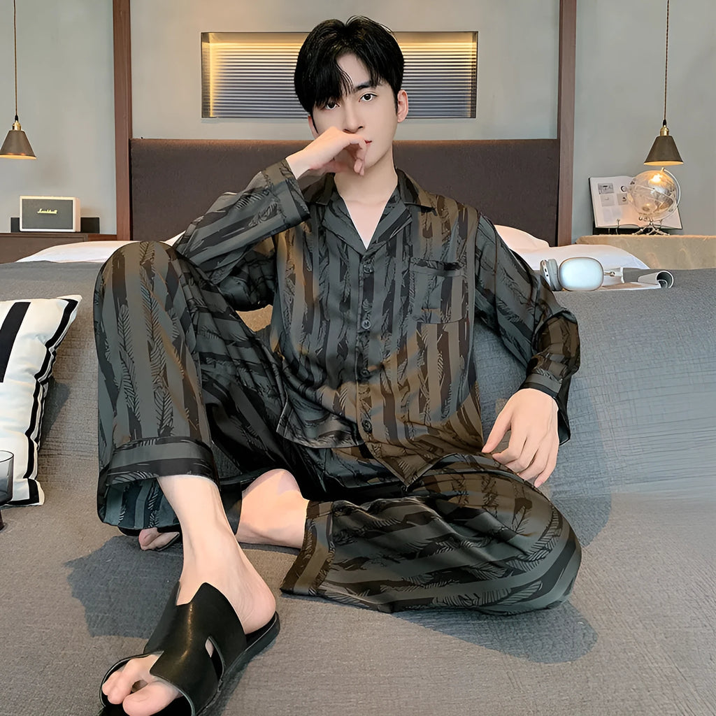 Men's black striped Ice silk long sleeve V-neck pajama set with trousers.