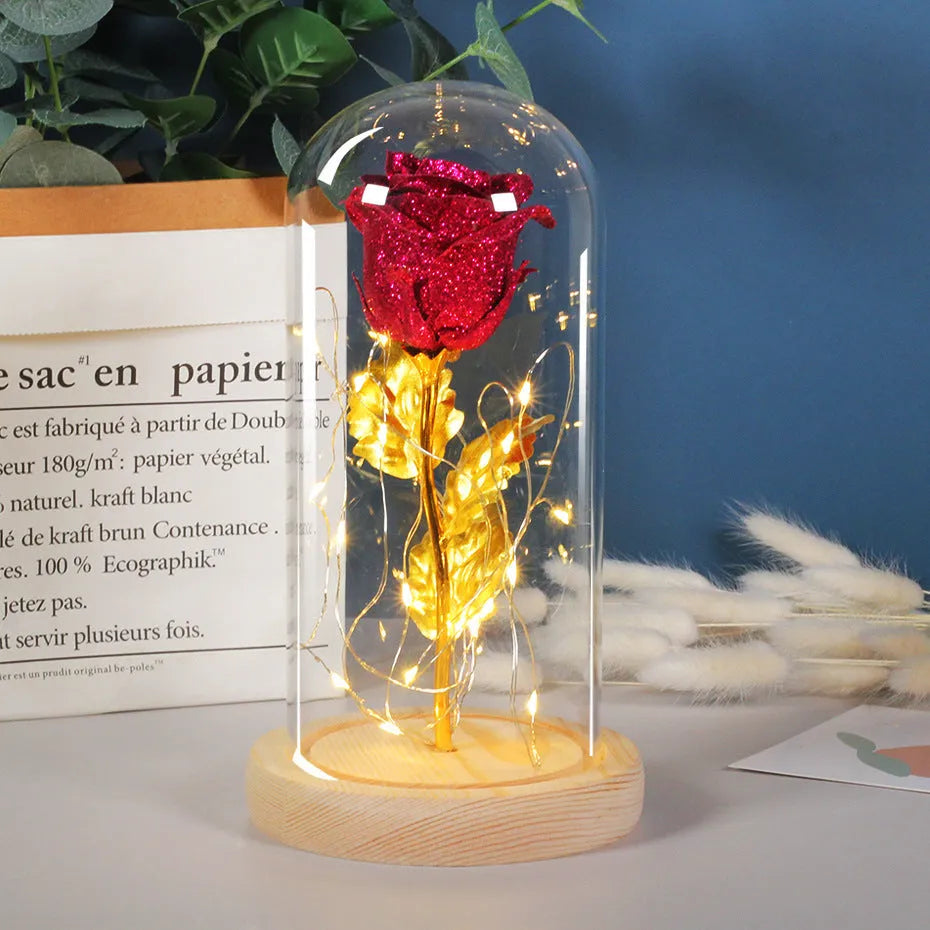 Eternal rose flower LED light in glass cover with warm white glow, six colours available, handmade