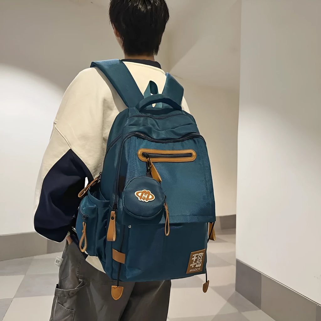Large capacity nylon backpack for middle school students with curved shoulder straps in multiple colour options