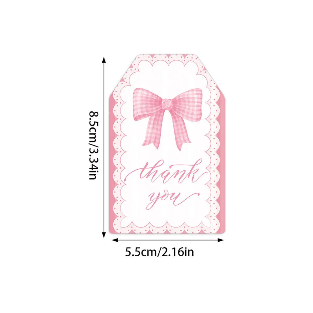 Set of 60 paper birthday gift tags with natural hemp rope in three bowknot designs.