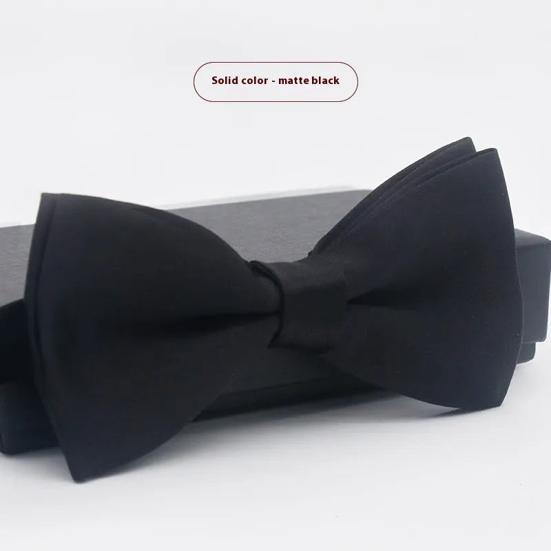 Solid colour polyester bow tie with flat head design measuring 12cm by 6cm