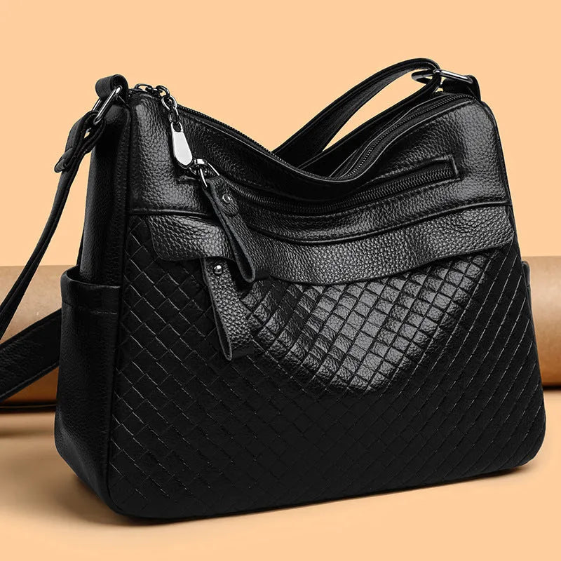 Women's soft PU leather crossbody bag in black with diamond pattern stitching, vertical rectangle shape 28x22x11cm