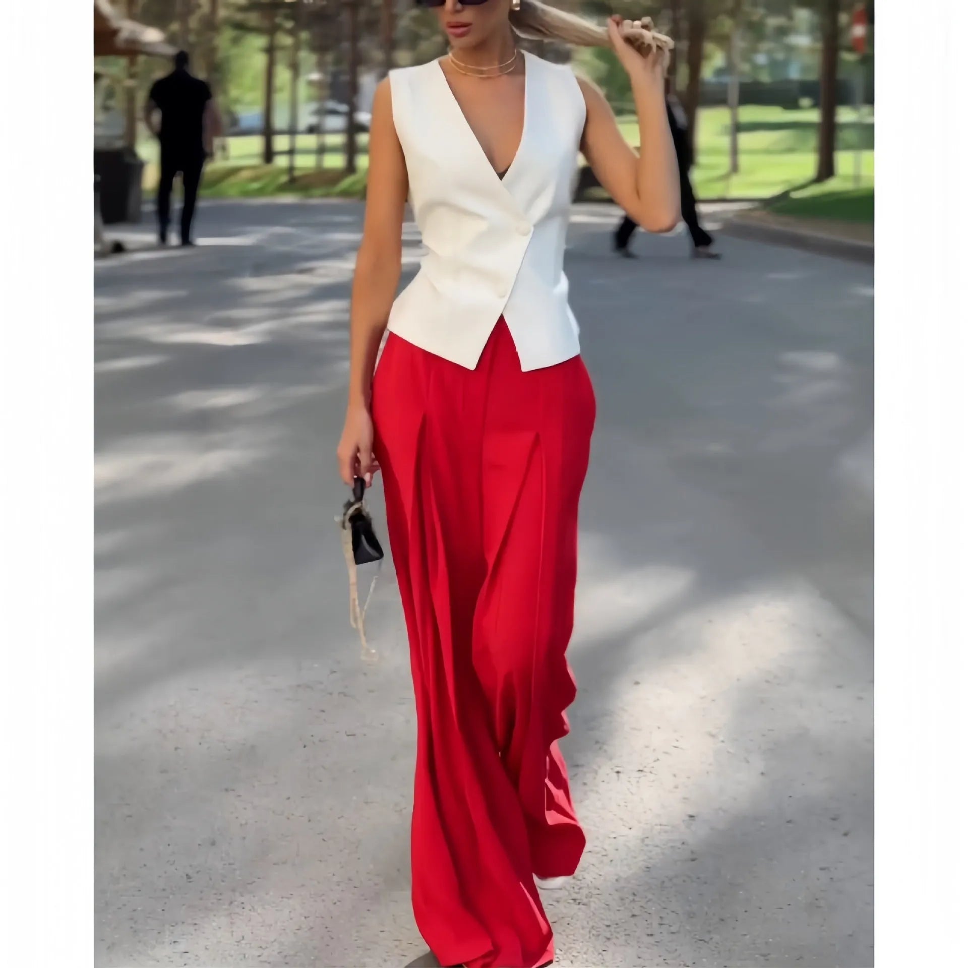 Women's beige polyester two-piece set showing sleeveless V-neck top with high-waist wide-leg trousers