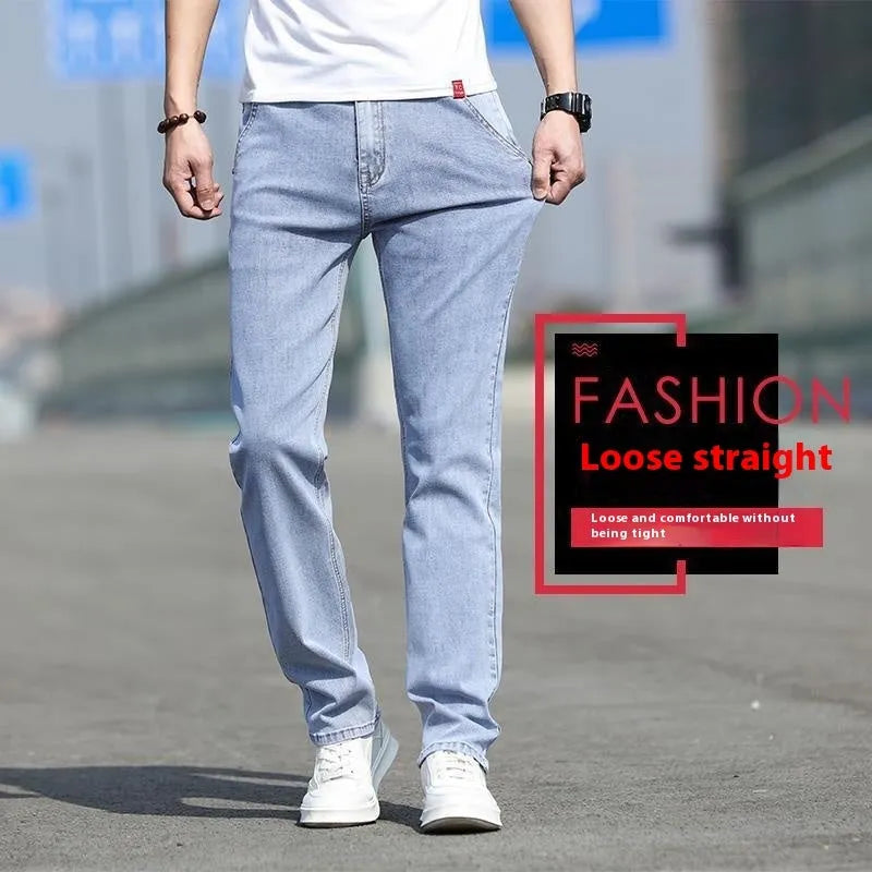 Men's smoky gray straight tube jeans with low waist and zipper fly closure