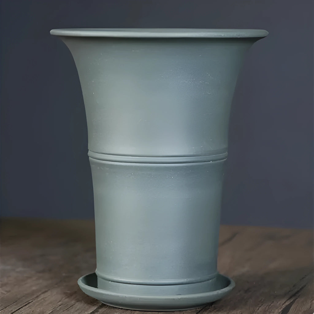 Large-diameter purple clay orchid pot in S1787 colour, placed on a tabletop, suitable for clivia and succulents