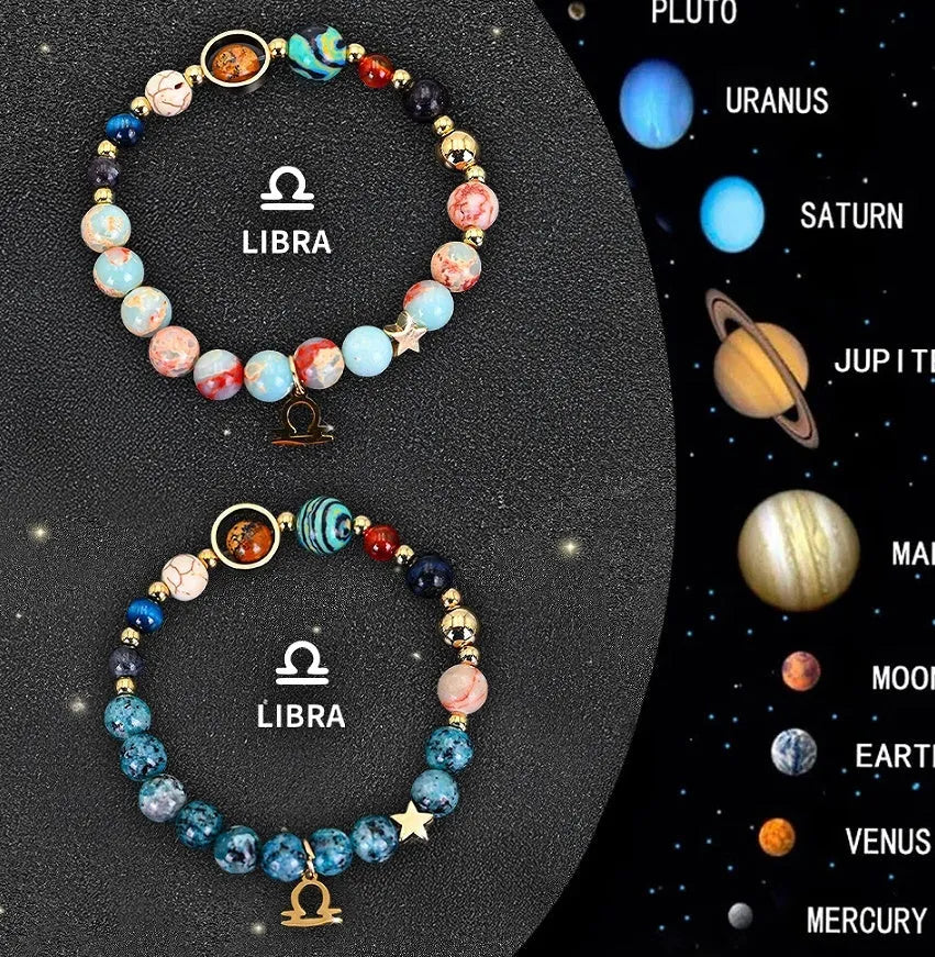 Two natural stone beaded bracelets on a table representing zodiac sign jewellery.