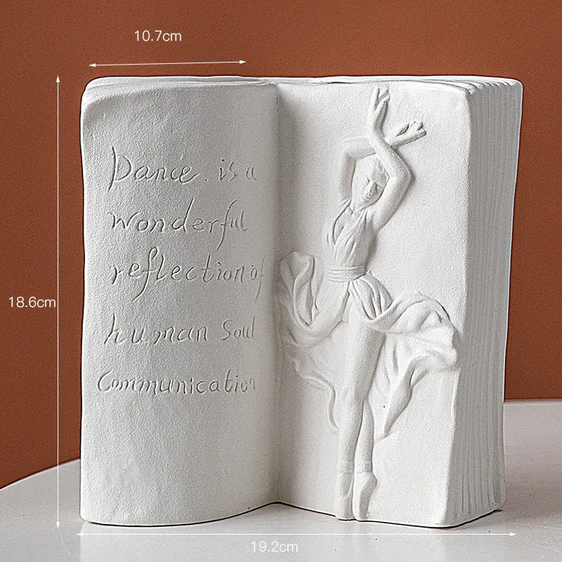 Glazed ceramic book stand in one of four artistic styles: lover, dancer, beauty and beast, or brushed face.