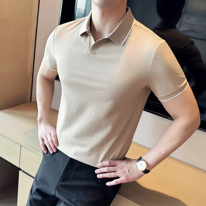 Mens solid colour lapel polo shirt in a cotton blend fabric on a hanger