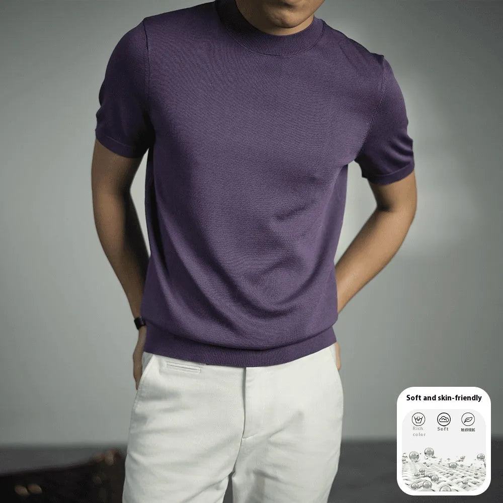 Men's solid colour knitted t-shirt with round neck and short sleeves in a polyester blend fabric.