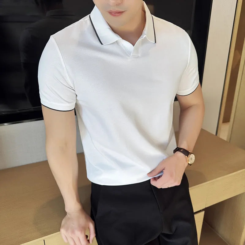 Mens solid colour lapel polo shirt in a cotton blend fabric on a hanger