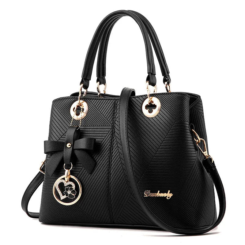 Retro fashion handbag in PU leather with shoulder strap and zipper opening