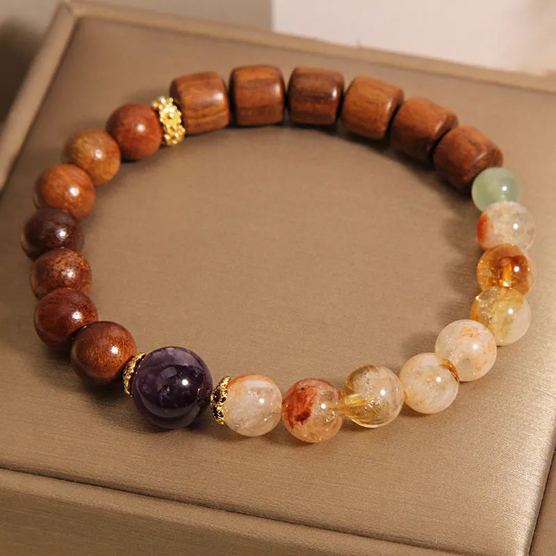 Women's bracelet with yellow tower crystal, ebony amethyst beads, pearls and rhinestones