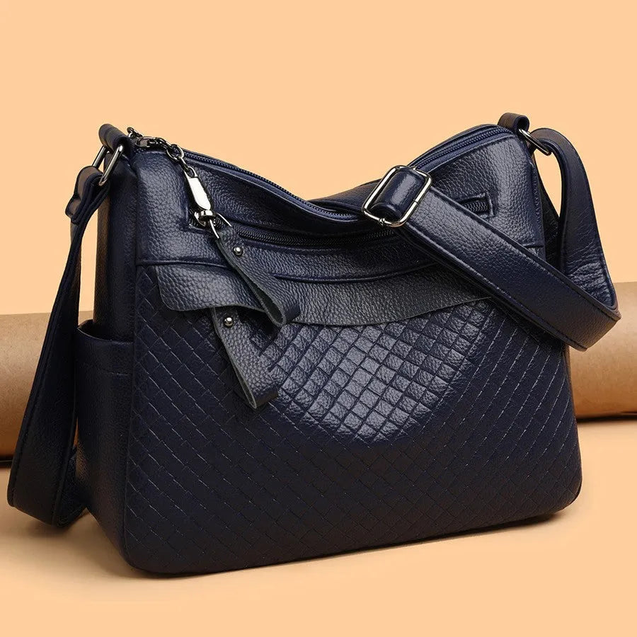 Women's soft PU leather crossbody bag in black with diamond pattern stitching, vertical rectangle shape 28x22x11cm