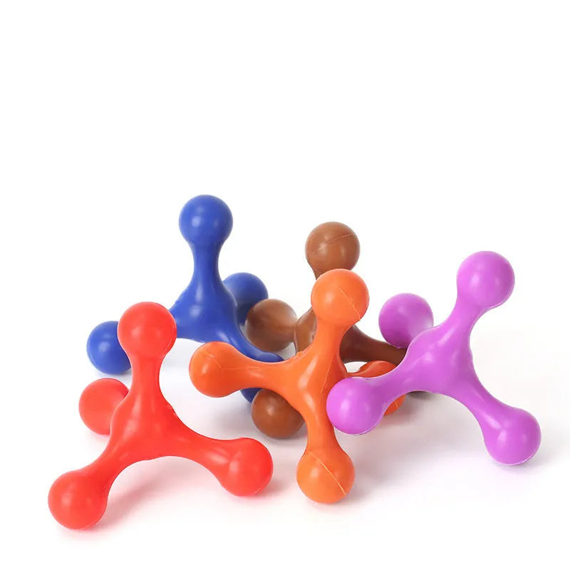 Silicone puppy chew toy with three legs in assorted colours for teething relief