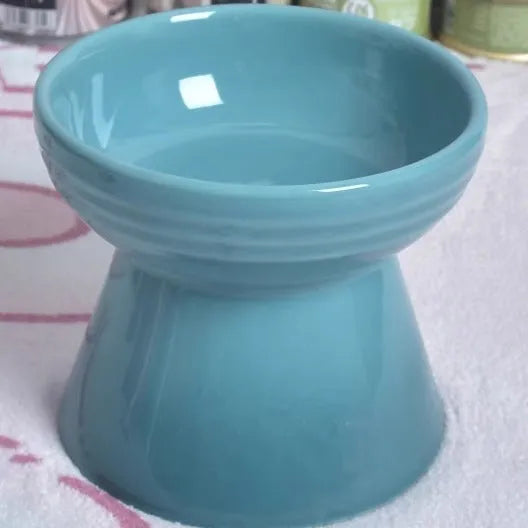 Black ceramic pet bowl with high foot neck protector design for spill prevention