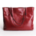 Wax cowhide leather handbag with horizontal design and two compartments