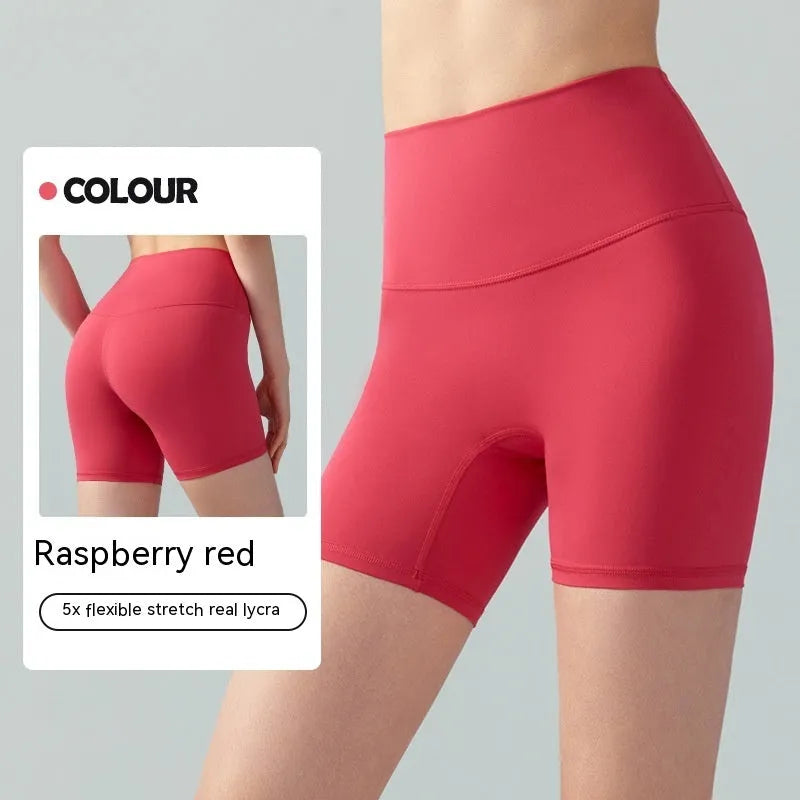 Women's lycra yoga tight shorts in leaf green colour showing high waist and short length design