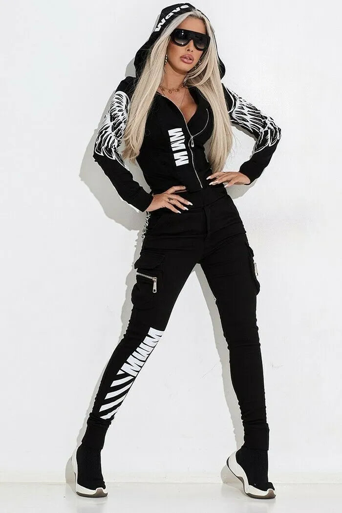 Black women's casual hooded suit with wings graphic print, featuring a zip-front top and matching trousers.