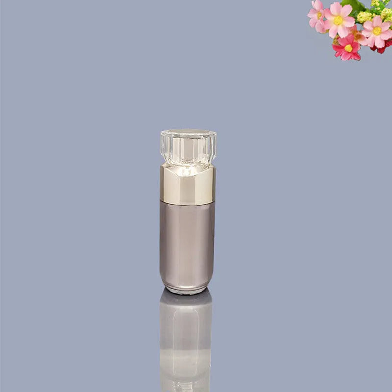 Acrylic cosmetics sub-bottling box with champagne gold and brushed white empty bottles in various sizes