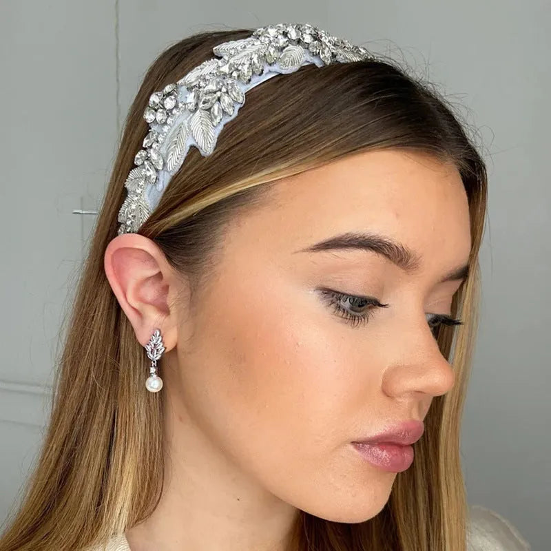 Geometric flower design earrings with micro inlaid zircon decoration in gold, platinum, and rose gold finishes