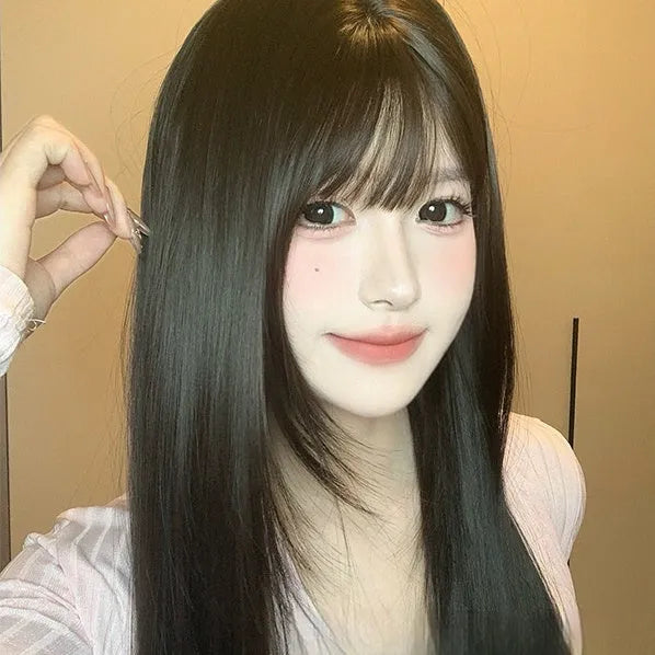 Dark brown long straight women's wig with bangs on wig head