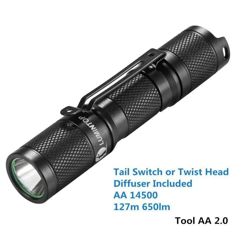 Lumintop Tool AA2.0 black compact keychain flashlight with Cree LED on metallic background