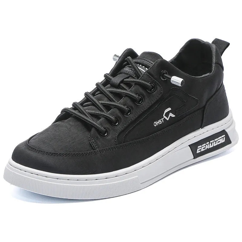 Grey men's canvas casual shoes with leather lining and rubber sole showing stitching details
