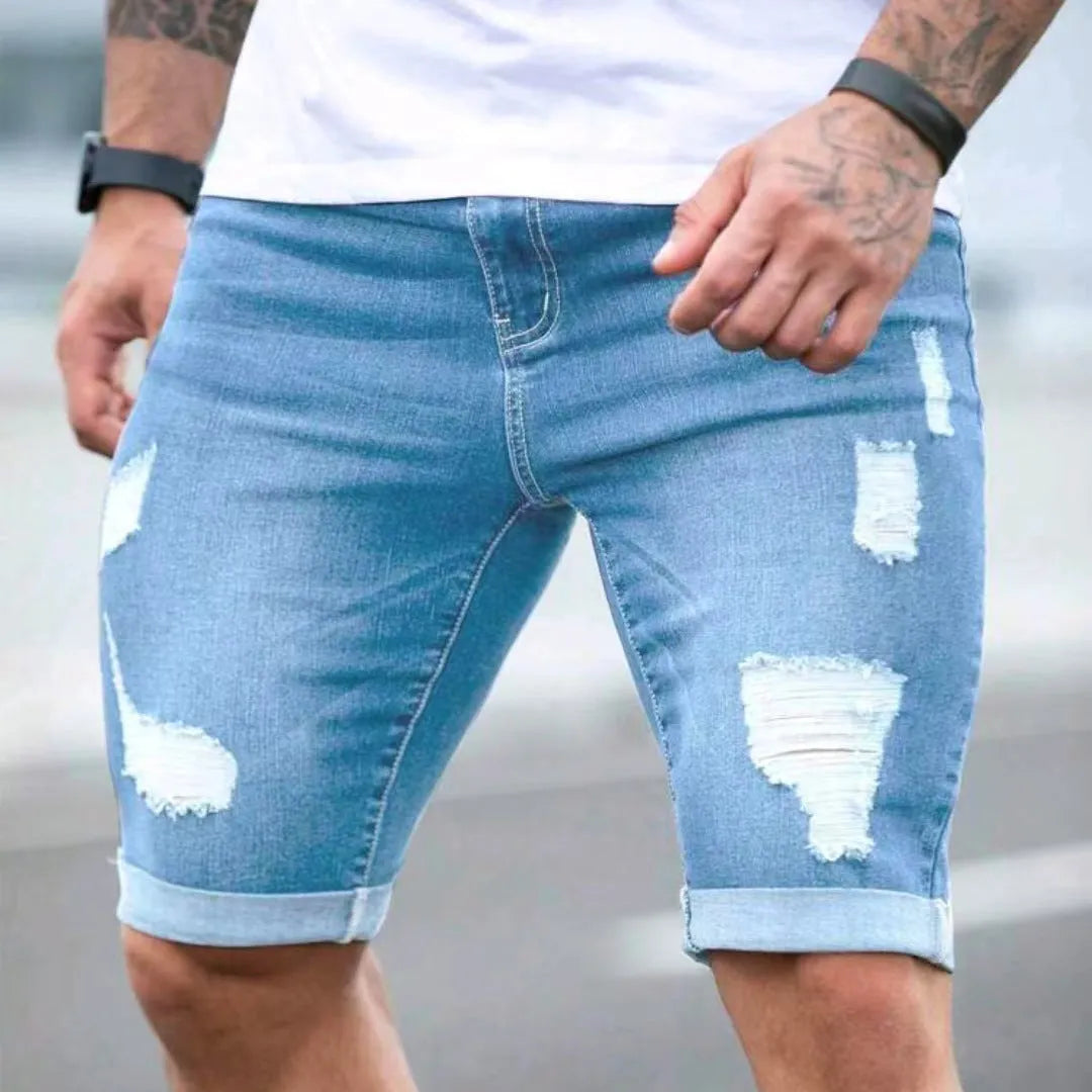Sky blue denim shorts with distressed holes and low waist design