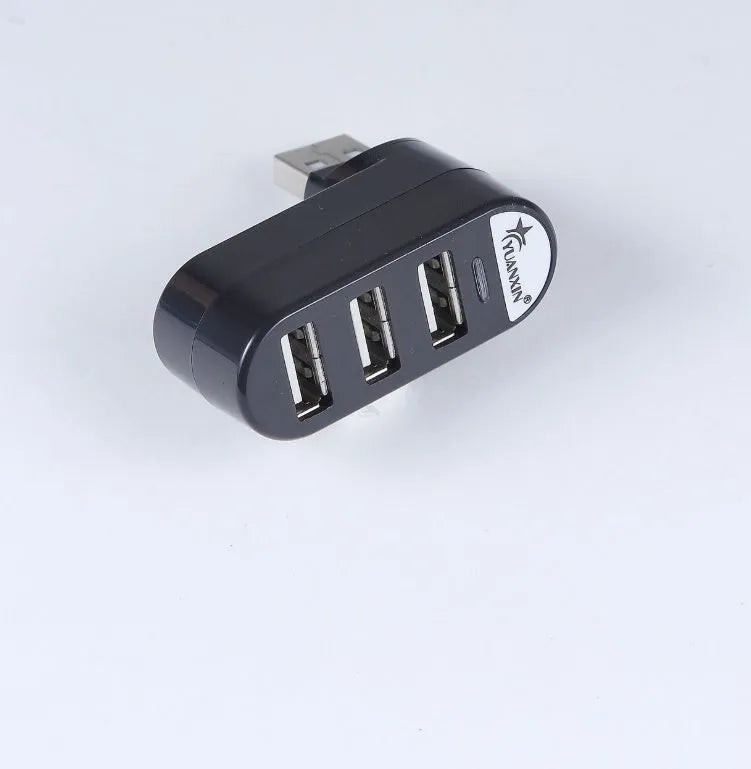 Black and white USB splitter hub showing multiple USB ports for computer connectivity