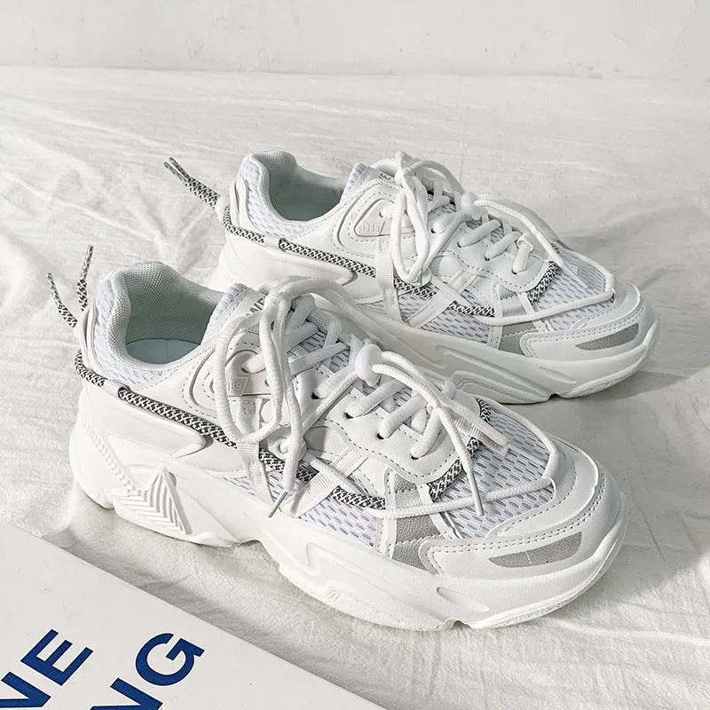 Men's white Korean style platform sports shoes with lace-up front on a plain background.