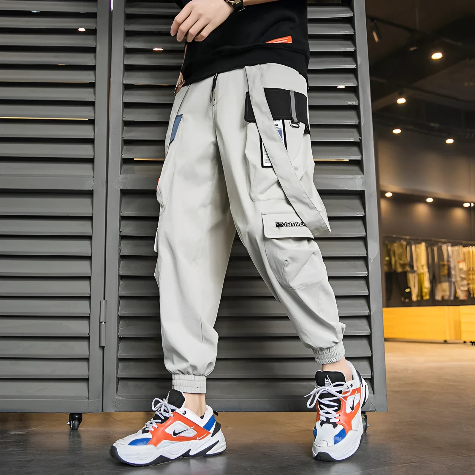 Men's Hong Kong fashion workwear casual pants with multi-pockets, loose fit, zip fly, in Black colour, T400 fabric