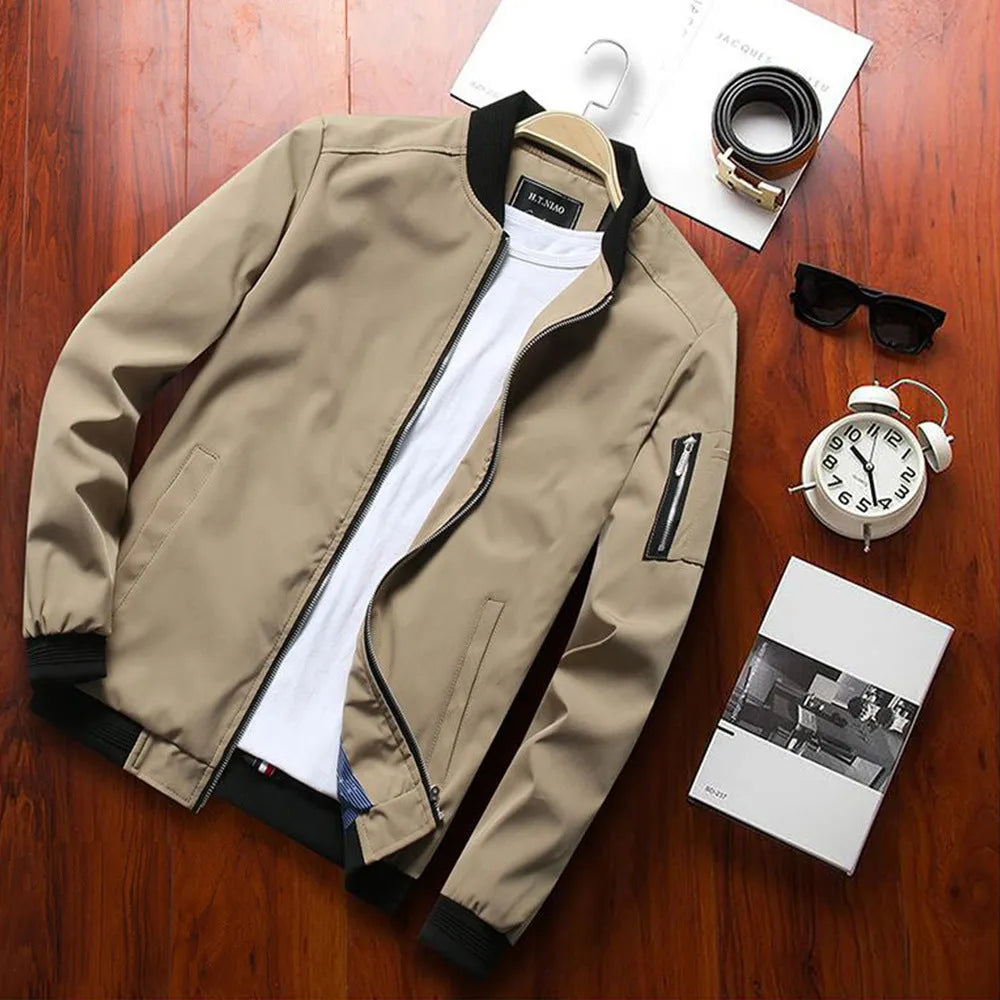 Men's slim fit casual baseball jacket with zipper closure and side pockets in a solid colour.